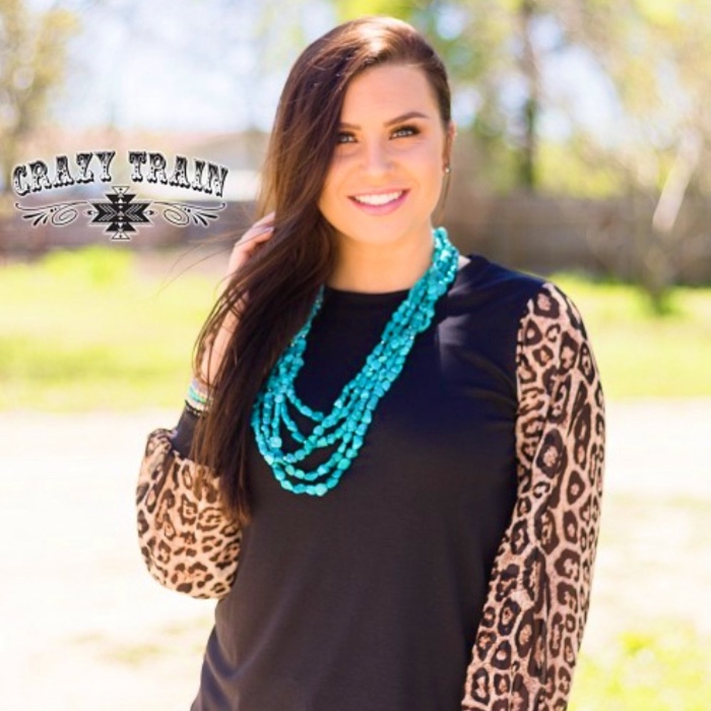 CRAZY TRAIN WITH BLACK TOP WITH LEOPARD SLEEVES